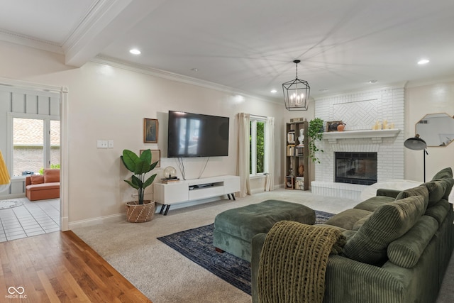 4601 Fairhope Dr, Indianapolis, IN 46237 - living area with ornamental molding, recessed lighting, a fireplace, baseboards, and a chandelier