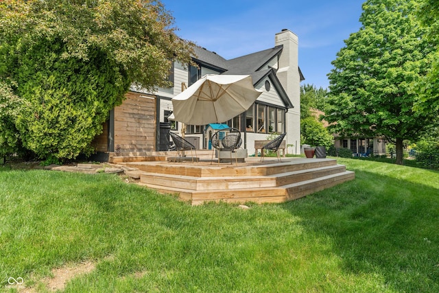 4601 Fairhope Dr, Indianapolis, IN 46237 - back of house featuring a chimney, a yard, and a deck
