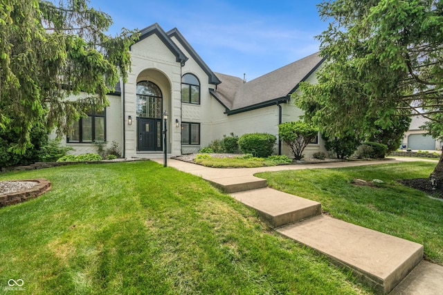 4601 Fairhope Dr, Indianapolis, IN 46237 - french country style house featuring brick siding and a front yard