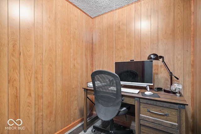 office space featuring wood walls