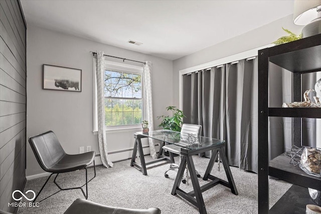 carpeted office space with baseboards