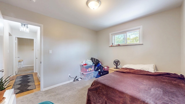 bedroom featuring baseboards