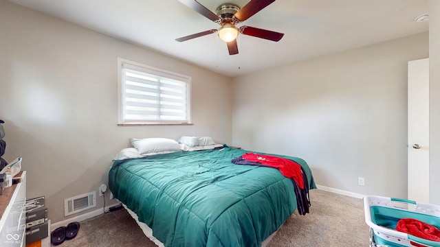 bedroom with carpet flooring, baseboards, and a ceiling fan