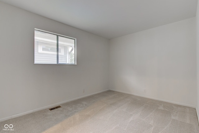 4956 W 11th St, Speedway, IN 46224 - unfurnished room featuring light carpet and baseboards