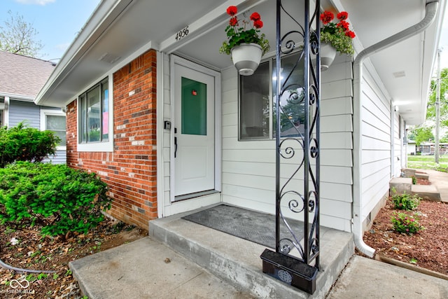 4956 W 11th St, Speedway, IN 46224 - property entrance featuring brick siding