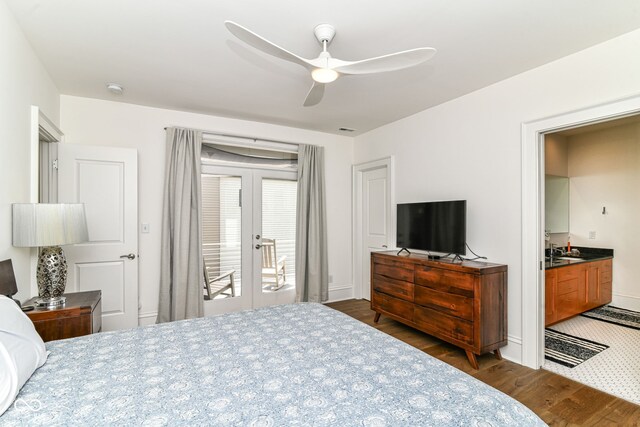1630 N New Jersey St, Indianapolis, IN 46202 - bedroom featuring dark wood finished floors, access to exterior, a sink, ceiling fan, and baseboards