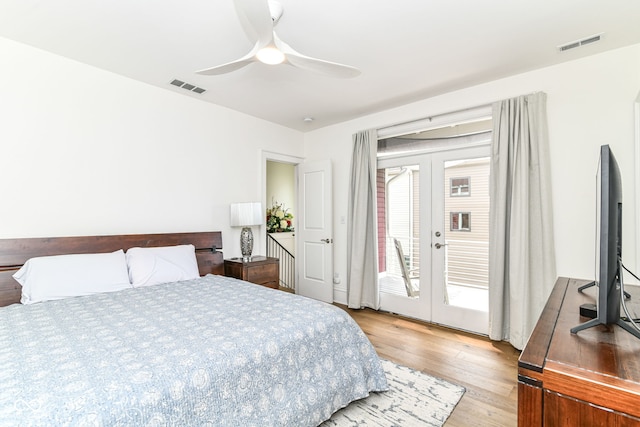 1630 N New Jersey St, Indianapolis, IN 46202 - bedroom with access to exterior, light wood-style floors, french doors, and ceiling fan