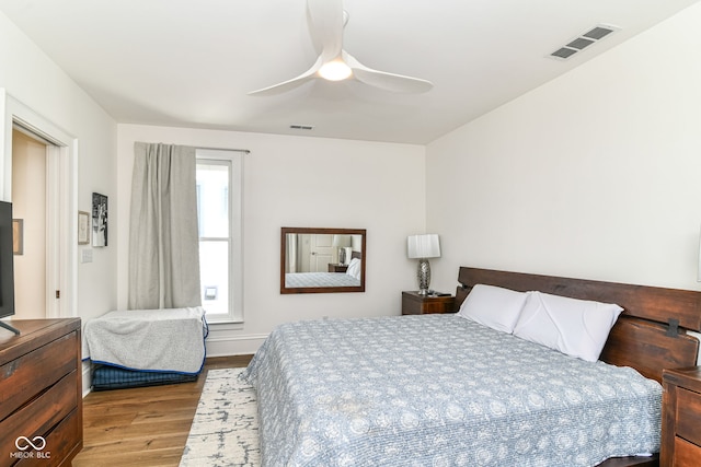 1630 N New Jersey St, Indianapolis, IN 46202 - bedroom with wood finished floors and a ceiling fan