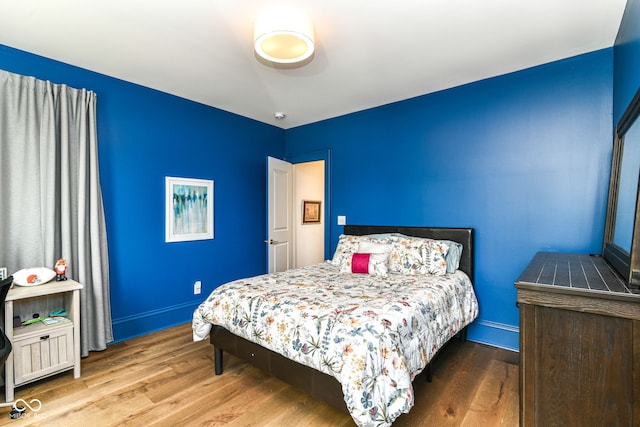 1630 N New Jersey St, Indianapolis, IN 46202 - bedroom featuring wood finished floors and baseboards
