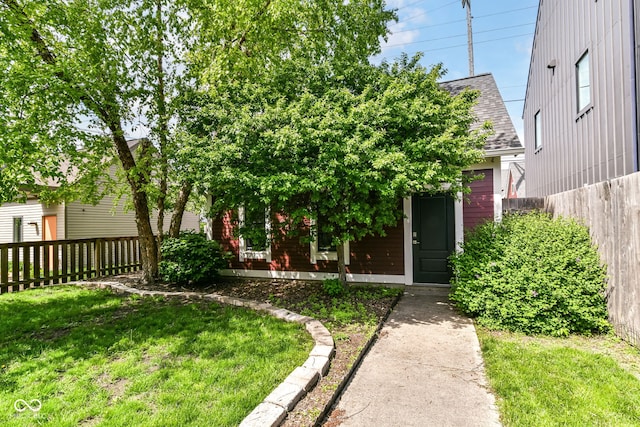 1630 N New Jersey St, Indianapolis, IN 46202 - doorway to property with roof with shingles