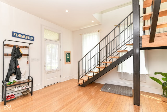 1630 N New Jersey St, Indianapolis, IN 46202 - entrance foyer with hardwood / wood-style flooring, stairway, recessed lighting, and baseboards