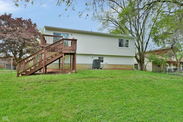 back of house with stairway and a wooden deck