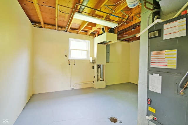 basement featuring heating unit