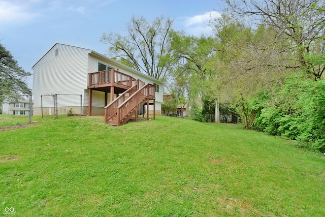 view of yard with a deck and stairway