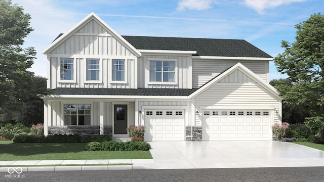 view of front facade with board and batten siding, driveway, an attached garage, a front yard, and stone siding