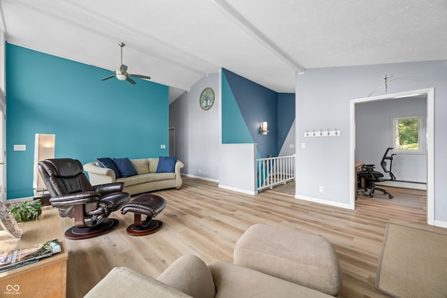 7753 Ivy Dr, Nineveh, IN 46164 - living area featuring lofted ceiling, a ceiling fan, wood finished floors, baseboards, and a baseboard heating unit