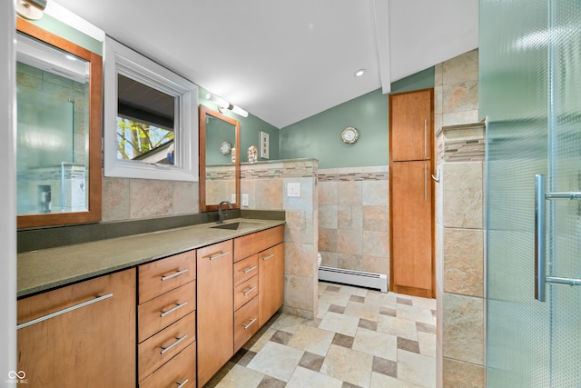 7753 Ivy Dr, Nineveh, IN 46164 - full bath with baseboard heating, tile walls, vaulted ceiling, vanity, and toilet