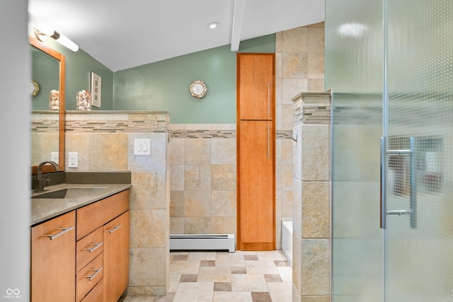 7753 Ivy Dr, Nineveh, IN 46164 - bathroom featuring baseboard heating, tile walls, lofted ceiling, a shower stall, and vanity