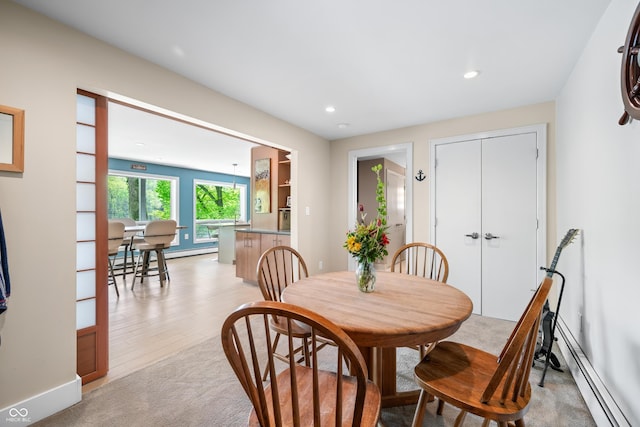 7753 Ivy Dr, Nineveh, IN 46164 - dining room with a baseboard heating unit, recessed lighting, and light carpet