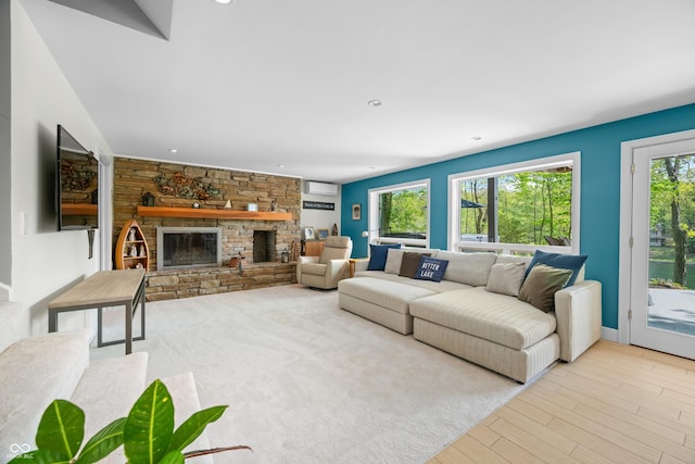 7753 Ivy Dr, Nineveh, IN 46164 - living room featuring a fireplace, wood finished floors, and recessed lighting
