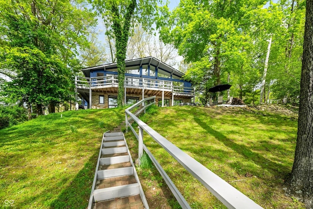7753 Ivy Dr, Nineveh, IN 46164 - rear view of property featuring a lawn and a deck