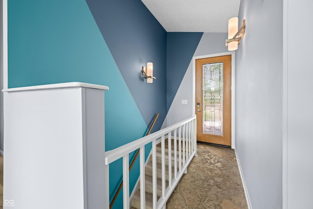 7753 Ivy Dr, Nineveh, IN 46164 - doorway to outside with stone finish flooring and baseboards