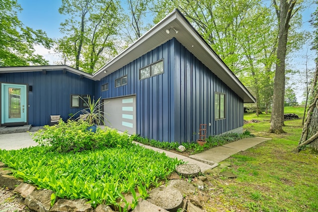 7753 Ivy Dr, Nineveh, IN 46164 - view of side of home featuring board and batten siding