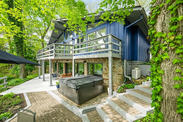 7753 Ivy Dr, Nineveh, IN 46164 - view of patio with a hot tub, a wooden deck, and stairs