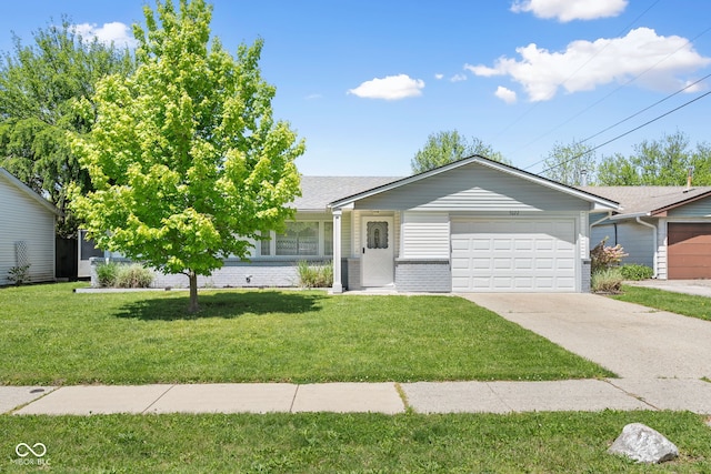 single story home with driveway, an attached garage, a front lawn, and brick siding