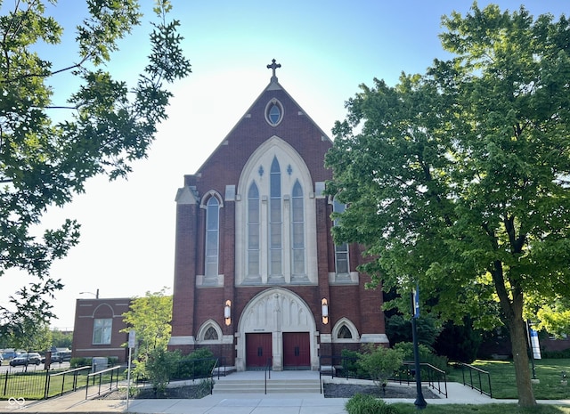 view of building exterior with fence