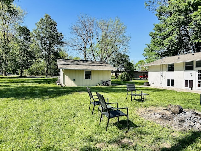 3081 Woodridge Rd, Shelbyville, IN 46176 - view of grassy yard with an outbuilding