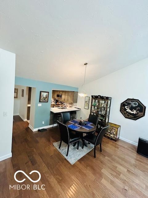 209 Brighton Ct, Greenwood, IN 46143 - dining room with wood finished floors and baseboards