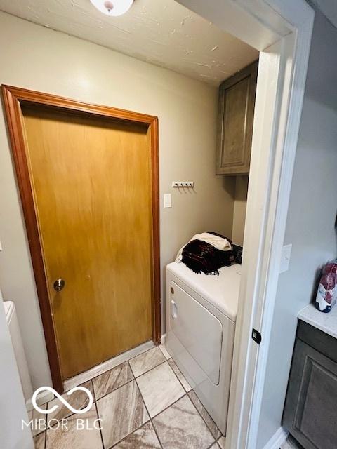 209 Brighton Ct, Greenwood, IN 46143 - laundry room featuring washer / clothes dryer and cabinet space