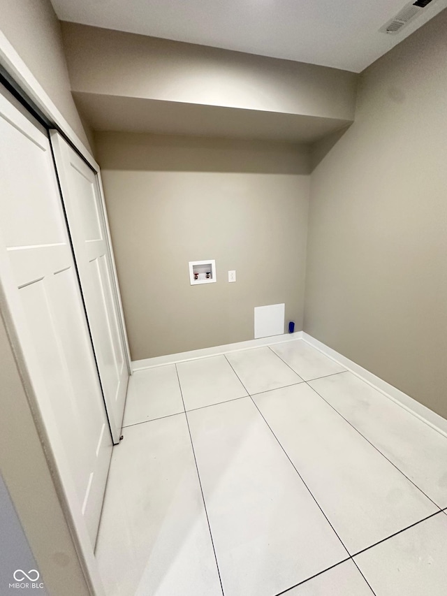 337 N Beville Ave, Indianapolis, IN 46201 - washroom with hookup for a washing machine and tile patterned floors