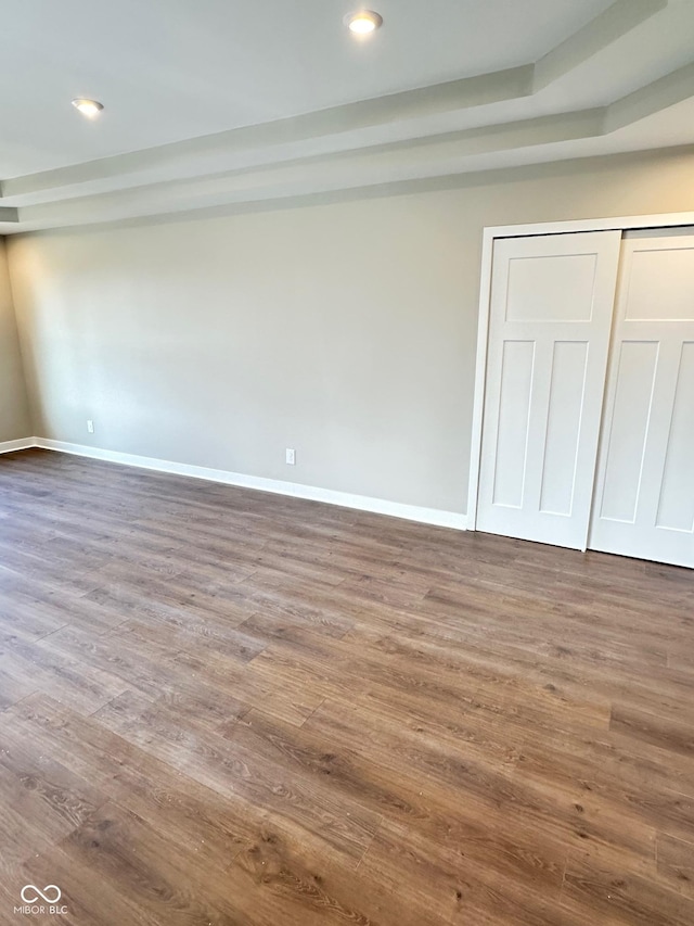 337 N Beville Ave, Indianapolis, IN 46201 - unfurnished bedroom with wood finished floors, baseboards, recessed lighting, and a closet