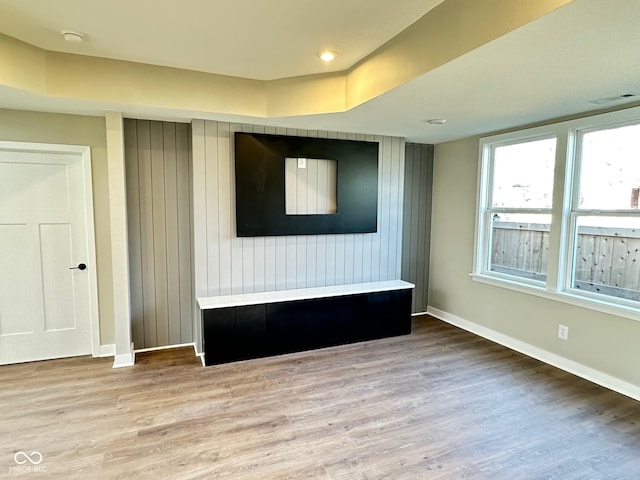 337 N Beville Ave, Indianapolis, IN 46201 - unfurnished living room featuring baseboards and wood finished floors