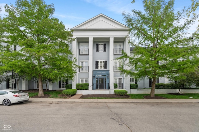 view of greek revival inspired property