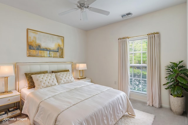 bedroom featuring carpet flooring, baseboards, and a ceiling fan