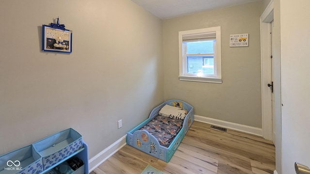 3436 Garden Ave, Indianapolis, IN 46222 - interior space with baseboards and wood finished floors