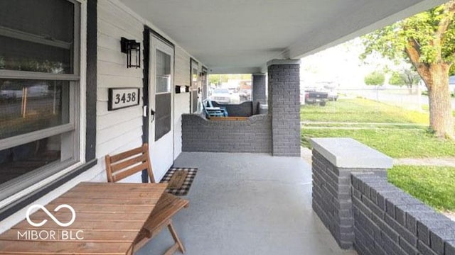 3436 Garden Ave, Indianapolis, IN 46222 - porch with a yard