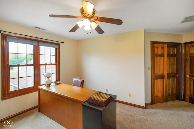 2508 Indian Creek Rd, Trafalgar, IN 46181 - home office with baseboards, light colored carpet, and a ceiling fan