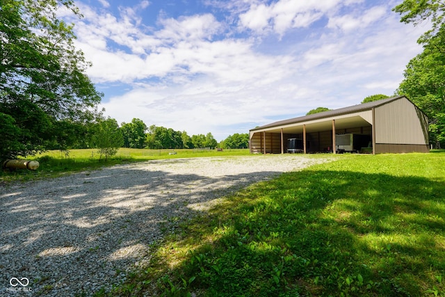 2508 Indian Creek Rd, Trafalgar, IN 46181 - view of grassy yard with a pole building and an outdoor structure