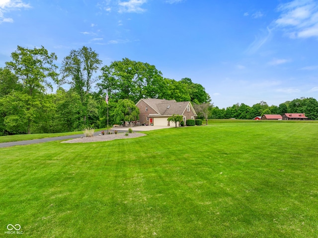 2508 Indian Creek Rd, Trafalgar, IN 46181 - view of grassy yard with driveway