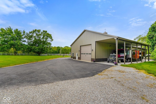 2508 Indian Creek Rd, Trafalgar, IN 46181 - view of side of property featuring a detached garage, a chimney, and an outdoor structure
