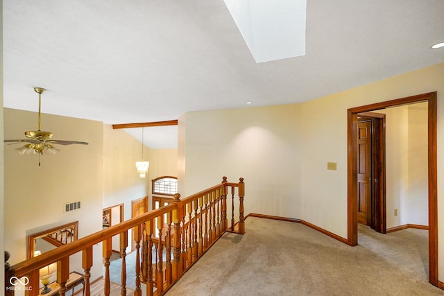 2508 Indian Creek Rd, Trafalgar, IN 46181 - corridor featuring an upstairs landing, carpet floors, vaulted ceiling, and baseboards