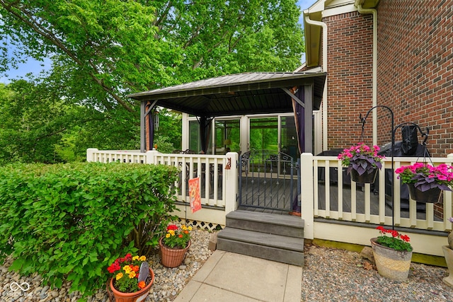 2508 Indian Creek Rd, Trafalgar, IN 46181 - property entrance with brick siding and a deck