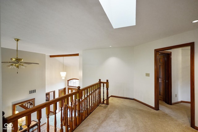 2508 Indian Creek Rd, Trafalgar, IN 46181 - hall featuring an upstairs landing, light colored carpet, baseboards, and lofted ceiling