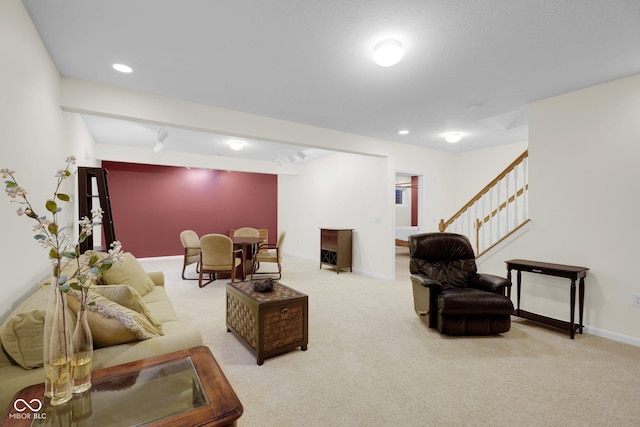 575 Dylan Dr, Avon, IN 46123 - carpeted living area with stairway, baseboards, and recessed lighting
