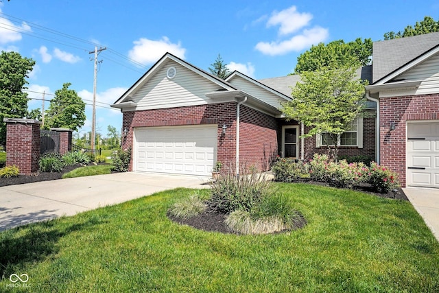 575 Dylan Dr, Avon, IN 46123 - ranch-style home with brick siding, a garage, concrete driveway, and a front lawn