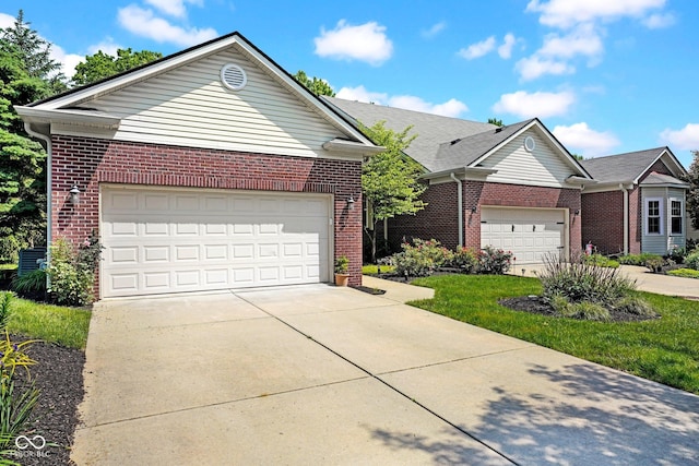 575 Dylan Dr, Avon, IN 46123 - single story home with brick siding, driveway, and a garage